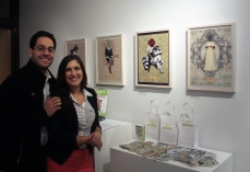 Or Gadish and Ana Linares in front of Ana's Floriography Tarot series